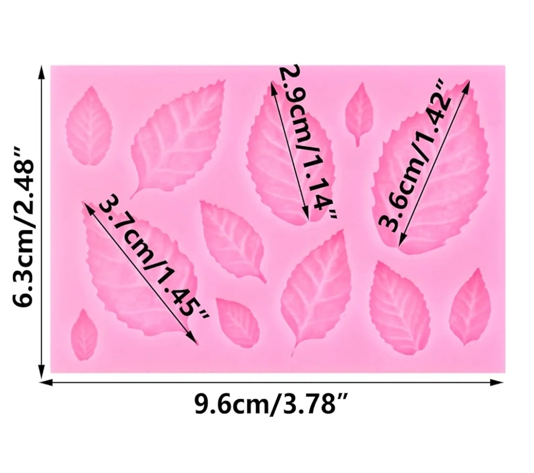 Silicone mold with leaf patterns and measurements on a pink background