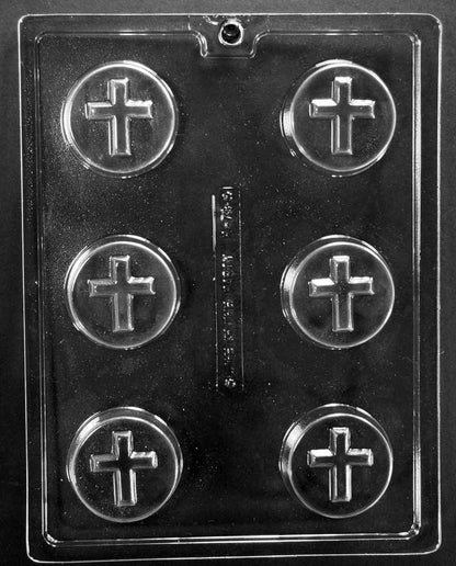 Chocolate mold with cross designs on a clear background